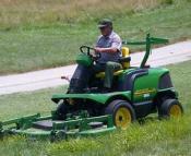 Maintenance Man on Lawn Mower