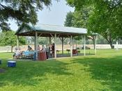 A park shelter with a group of women enjoying an event.